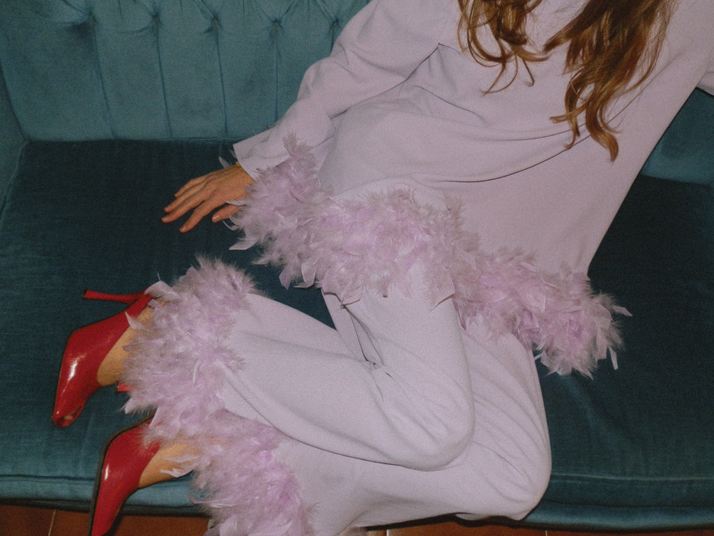 Pantaloni con piume